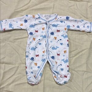 Kissy Kissy newborn one piece snap outfit with sea creatures design.